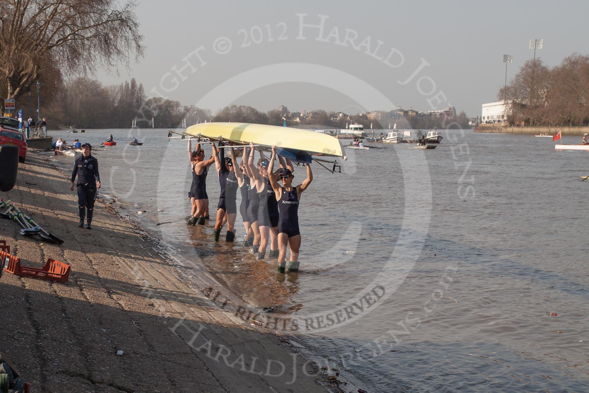 The Boat Race season 2012 - fixture OUBC vs Leander: The OUBC Isis squad returning from their fixture against Tideway Scullers. On the left cox Katherine Apfelbaum, carrying the boat are Tom Hilton, Chris Fairweather, Julian Bubb-Humfryes, Ben Snodin, Joe Dawson, Geordie Macleod, Justin Webb, and Tom Watson..




on 24 March 2012 at 14:58, image #153