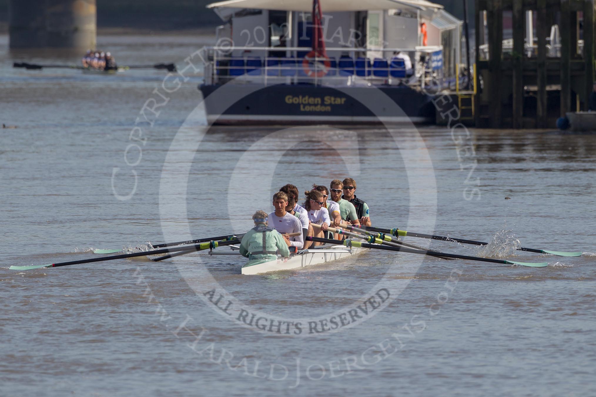The Boat Race season 2012 - fixture CUBC vs Molesey BC: The CUBC Blue Boat getting ready to race Molesey BC - cox Ed Bosson, stroke Niles Garratt, Alexander Scharp, Steve Dudek, Mike Thorp, Alex Ross, Jack Lindeman, Moritz Schramm, and bow David Nelson, rowing towards Putney Bridge and Putney Pier..




on 25 March 2012 at 14:43, image #32