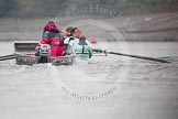 Cambridge University Boat Club chief coach Steve Trapmore and the CUBC Blue Boat during an outing on the River Thames, two days before the 2012 Boat Race.