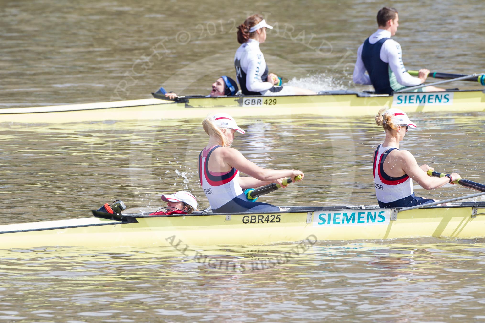 The Boat Race 2012: Close racing in the The Adaptive Race: The Adaptive four, cox Lily van den Broecke, bow Pamela Relph, and two seat Naomi Riches. Behind, in the Start boat, cox Henry Fieldman, bow Olivia Marshall, and two seat Will King..




on 07 April 2012 at 12:48, image #76