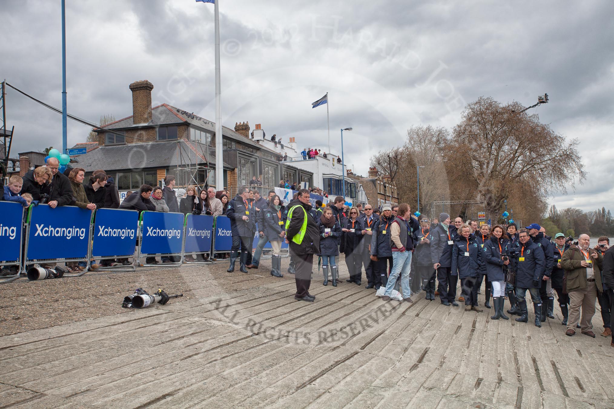 The Boat Race 2012: Members of the media and officials waiting to board the boats that will follow the Boat Race. On the left the BT Press Centre in the Thames Rowing Club boathouse..




on 07 April 2012 at 13:24, image #126