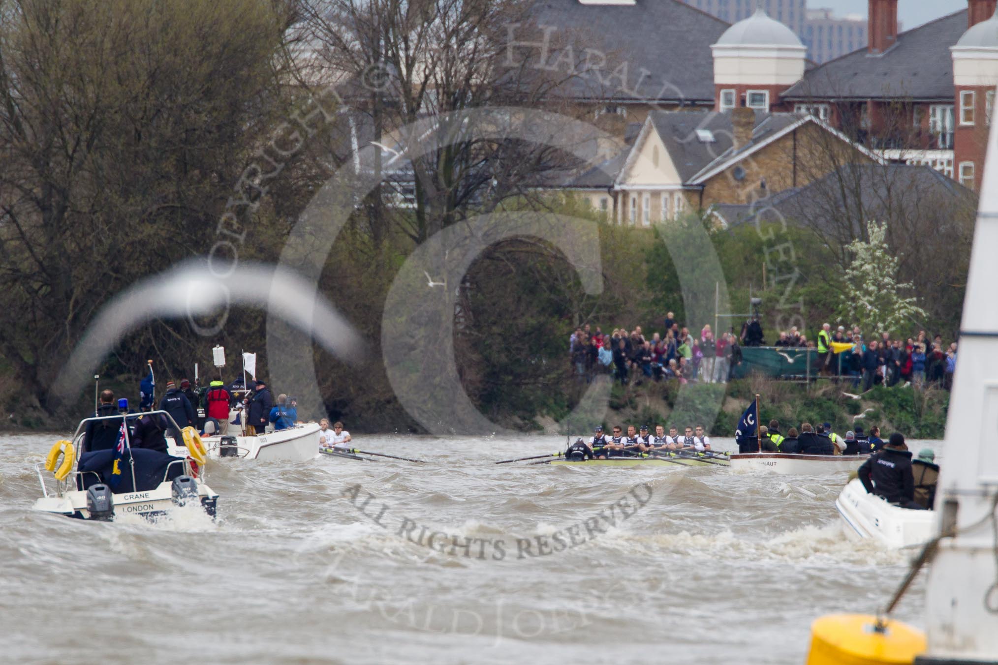 The Boat Race 2012: The 2012 Boat Race, with the boats approaching the Mile Post: The Cambridge Blue Boat on the left, nearly covered by the boat of the umpire, and the Oxford Blue Boat on the right..




on 07 April 2012 at 14:18, image #289