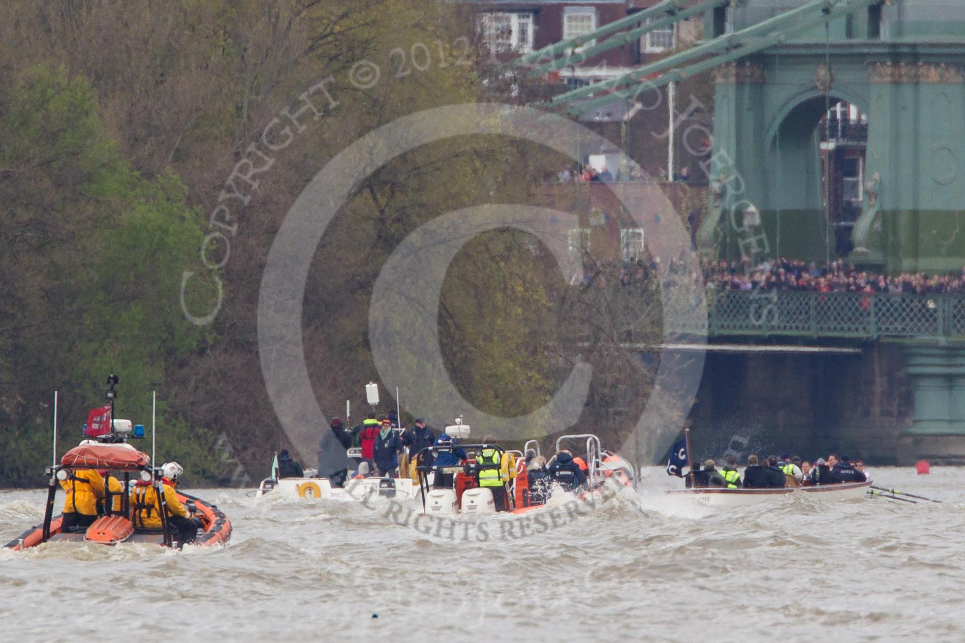 The Boat Race 2012: The 2012 Boat Race, with the boats approaching Hammersmith Bridge: The Cambridge Blue Boat on the left, nearly covered by the boat of the umpire, and the Oxford Blue Boat on the right..




on 07 April 2012 at 14:20, image #297