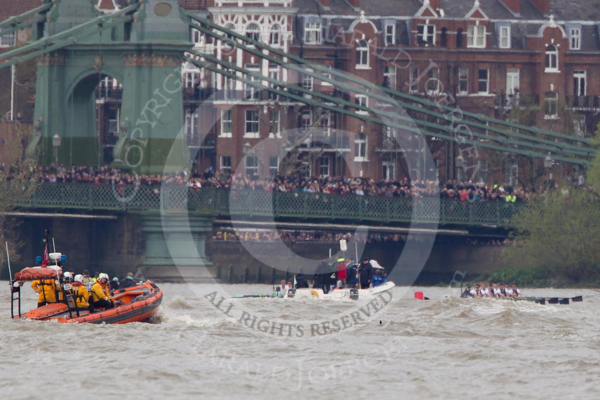 The Boat Race 2012: The 2012 Boat Race, with the boats approaching Hammersmith Bridge: The Cambridge Blue Boat on the left, nearly covered by the boat of the umpire, and the Oxford Blue Boat on the right..




on 07 April 2012 at 14:20, image #301
