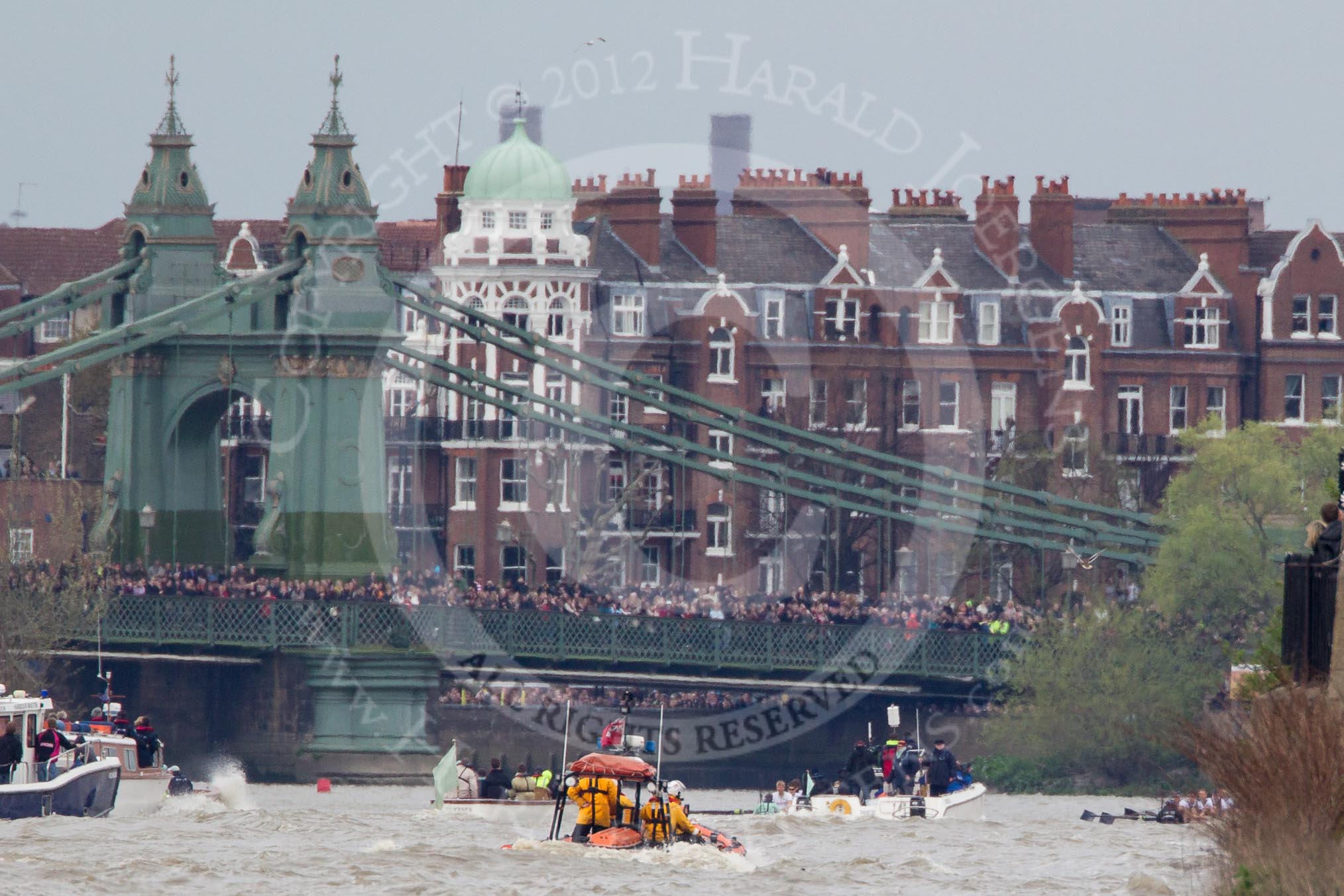 The Boat Race 2012: The 2012 Boat Race, with the boats approaching Hammersmith Bridge: The Cambridge Blue Boat on the left, nearly covered by the boat of the umpire, and the Oxford Blue Boat on the right..




on 07 April 2012 at 14:20, image #303