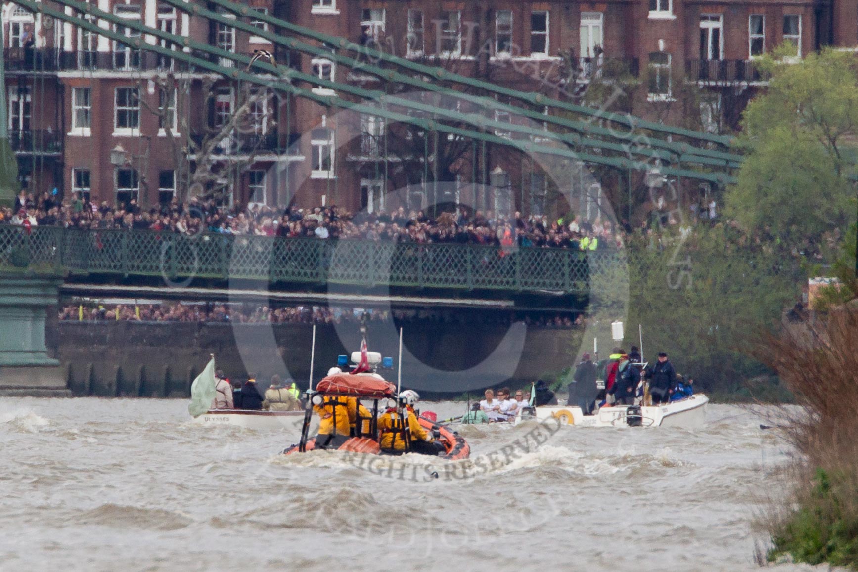 The Boat Race 2012: The 2012 Boat Race, with the boats approaching Hammersmith Bridge: The Cambridge Blue Boat on the left, nearly covered by the boat of the umpire, and the Oxford Blue Boat on the right..




on 07 April 2012 at 14:20, image #304