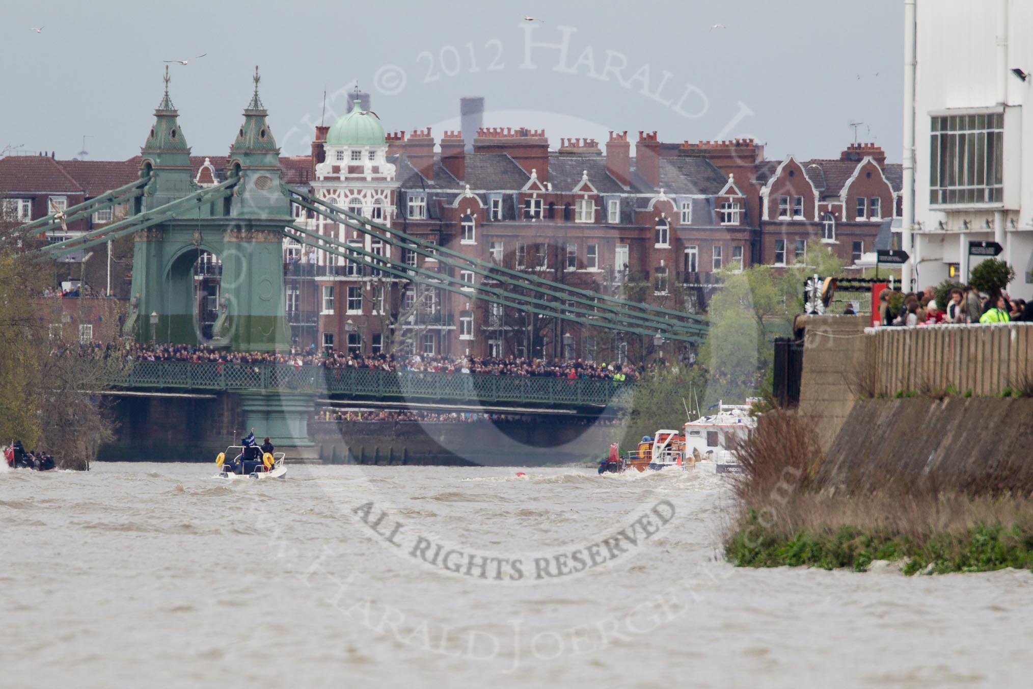 The Boat Race 2012: The 2012 Boat Race, with the boats approaching Hammersmith Bridge: The Cambridge Blue Boat on the left, nearly covered by the boat of the umpire, and the Oxford Blue Boat on the right..




on 07 April 2012 at 14:20, image #306