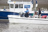 The Boat Race 2012: The Port of London Authority Harbour Master and the white launch to be used by the umpire, with camera equipment being set up, including the ball shaped gyro-mounted camera on the left..




on 07 April 2012 at 09:36, image #7