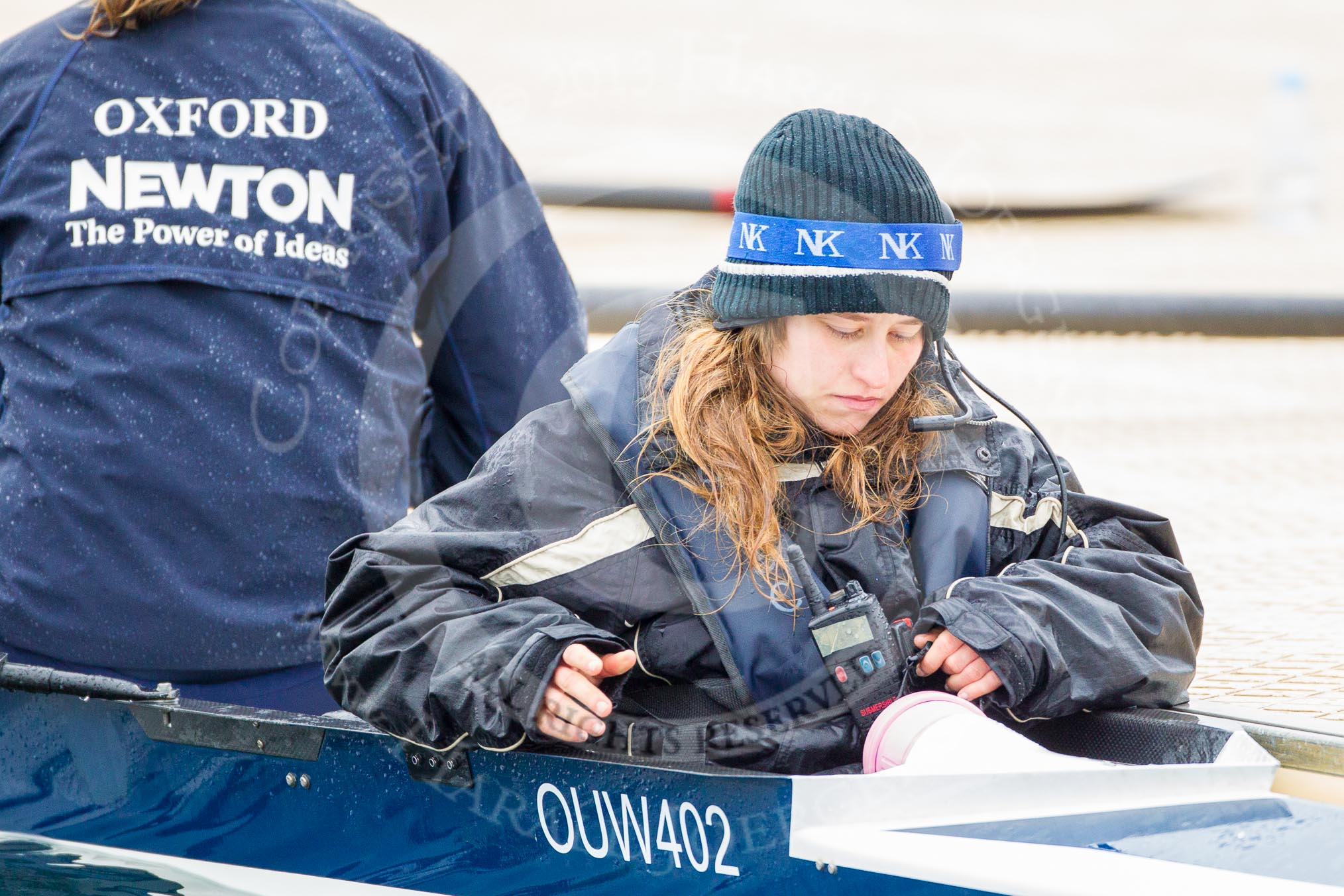 The Boat Race season 2013 - fixture OUWBC vs Molesey BC: OUWBC's cox Sonya Milanova getting into a coxed four at Dorney Lake..
Dorney Lake,
Dorney, Windsor,
Berkshire,
United Kingdom,
on 24 February 2013 at 10:55, image #12