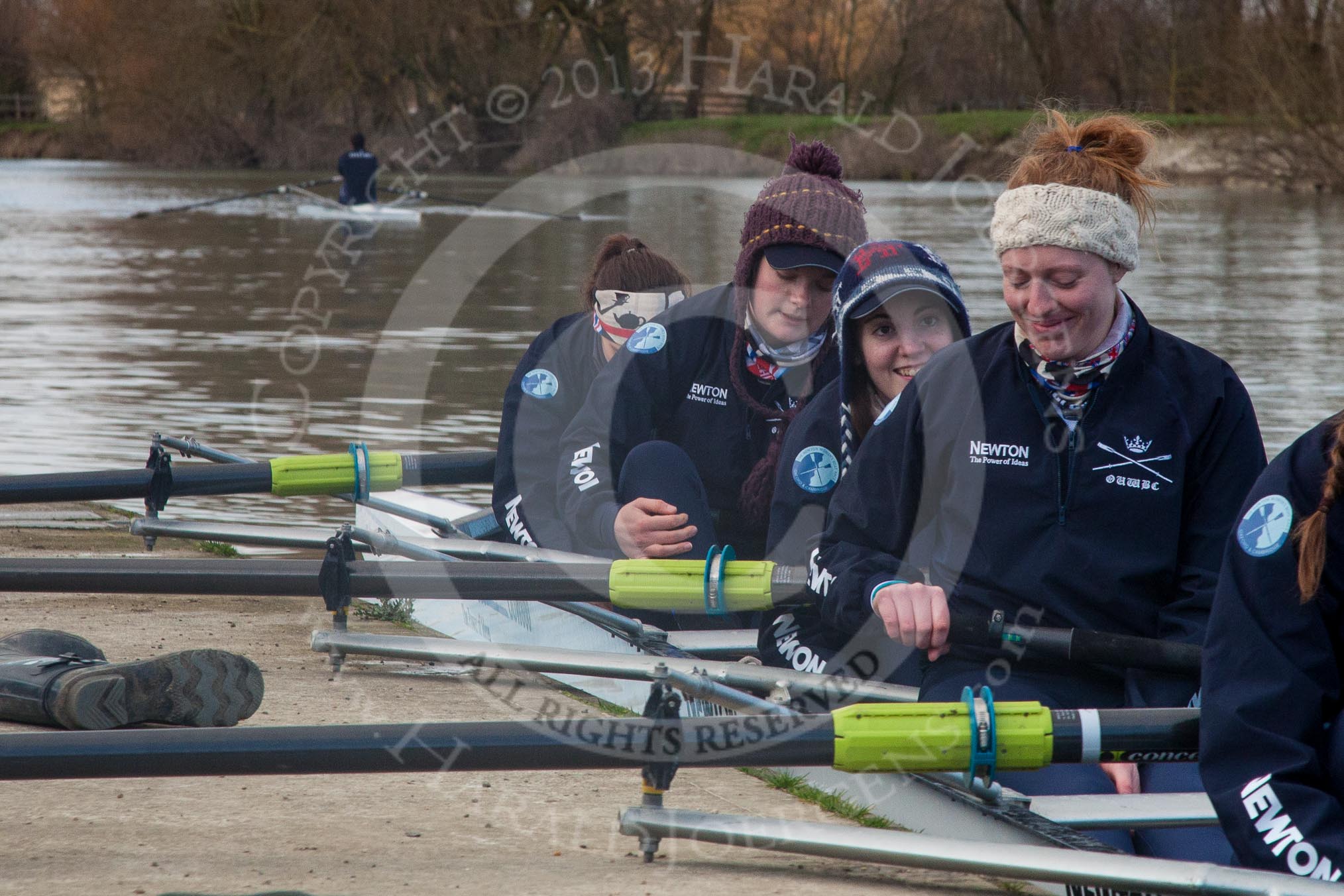 The Boat Race season 2013 - OUWBC training: The crew of Osiris, the OUWBC reserve boat, getting ready: Bow: Coralie Viollet-Djelassi, then Elspeth Cumber, Hannah Ledbury, and Eleanor Darlington..
Fleming Boathouse,
Wallingford,
Oxfordshire,
United Kingdom,
on 13 March 2013 at 16:52, image #33