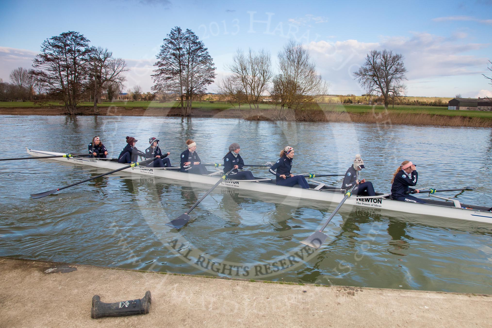 The Boat Race season 2013 - OUWBC training: The crew of Osiris, the OUWBC reserve boat, getting ready: Bow Coralie Viollet-Djelassi, then Elspeth Cumber, Hannah Ledbury, Eleanor Darlington, Rachel Purkess, Caitlin Goss, Annika Bruger, and stroke Emily Chittock..
Fleming Boathouse,
Wallingford,
Oxfordshire,
United Kingdom,
on 13 March 2013 at 16:53, image #35