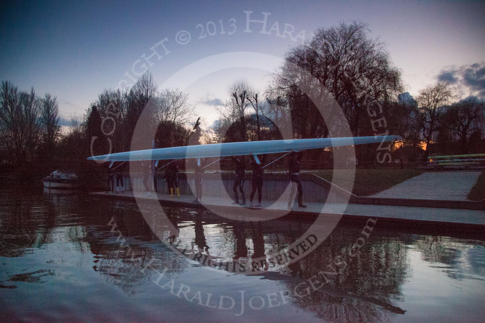 The Boat Race season 2013 - OUWBC training: The OUWBC Blue Boat crew back at Fleming Boathouse, in last light, afther the training session..
River Thames,
Wallingford,
Oxfordshire,
United Kingdom,
on 13 March 2013 at 18:22, image #236