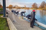Photo 1303131649185D27382HaraldJoergens The Boat Race season 2013 - OUWBC training: The OUWBC Blue Boat squad getting ready at Fleming Boathouse - bow Mariann Novak, Alice Carrington-Windo, Mary Foord-Weston, Jo Lee, Amy Varney, Harriet Keane, Anastasia Chitty, stroke Maxie Scheske, and cox Katie Apfelbaum..
Fleming Boathouse,
Wallingford,
Oxfordshire,
United Kingdom,
on 13 March 2013 at 16:49, image #17