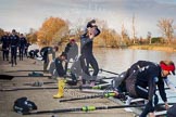 Photo 1303131650225D27402HaraldJoergens The Boat Race season 2013 - OUWBC training: The OUWBC Blue Boat squad getting ready at Fleming Boathouse - bow Mariann Novak, Alice Carrington-Windo, Mary Foord-Weston, Jo Lee, Amy Varney, Harriet Keane, Anastasia Chitty, stroke Maxie Scheske, and cox Katie Apfelbaum. In the background the Osiris crew..
Fleming Boathouse,
Wallingford,
Oxfordshire,
United Kingdom,
on 13 March 2013 at 16:50, image #24