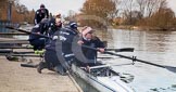 Photo 1303131651315D27423HaraldJoergens The Boat Race season 2013 - OUWBC training: The crew of Osiris, the OUWBC reserve boat, getting ready: Cox Sophie Shawdon, stroke Emily Chittock, then Annika Bruger, Caitlin Goss, Rachel Purkess, Eleanor Darlington, Hannah Ledbury, Elspeth Cumber,  and bow Coralie Viollet-Djelassi..
Fleming Boathouse,
Wallingford,
Oxfordshire,
United Kingdom,
on 13 March 2013 at 16:51, image #29