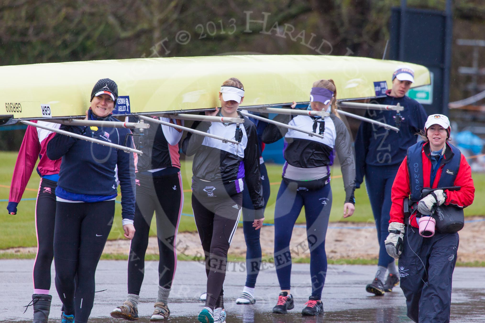 The Boat Race season 2013 - fixture OUWBC vs Olympians: The Olympians carrying their boat to Dorney Lake, on the right Kate Johnson, Bethan Walters, Christiana Amacker and Caryn Davies, with cox Victoria Stulgis..
Dorney Lake,
Dorney, Windsor,
Buckinghamshire,
United Kingdom,
on 16 March 2013 at 11:08, image #17