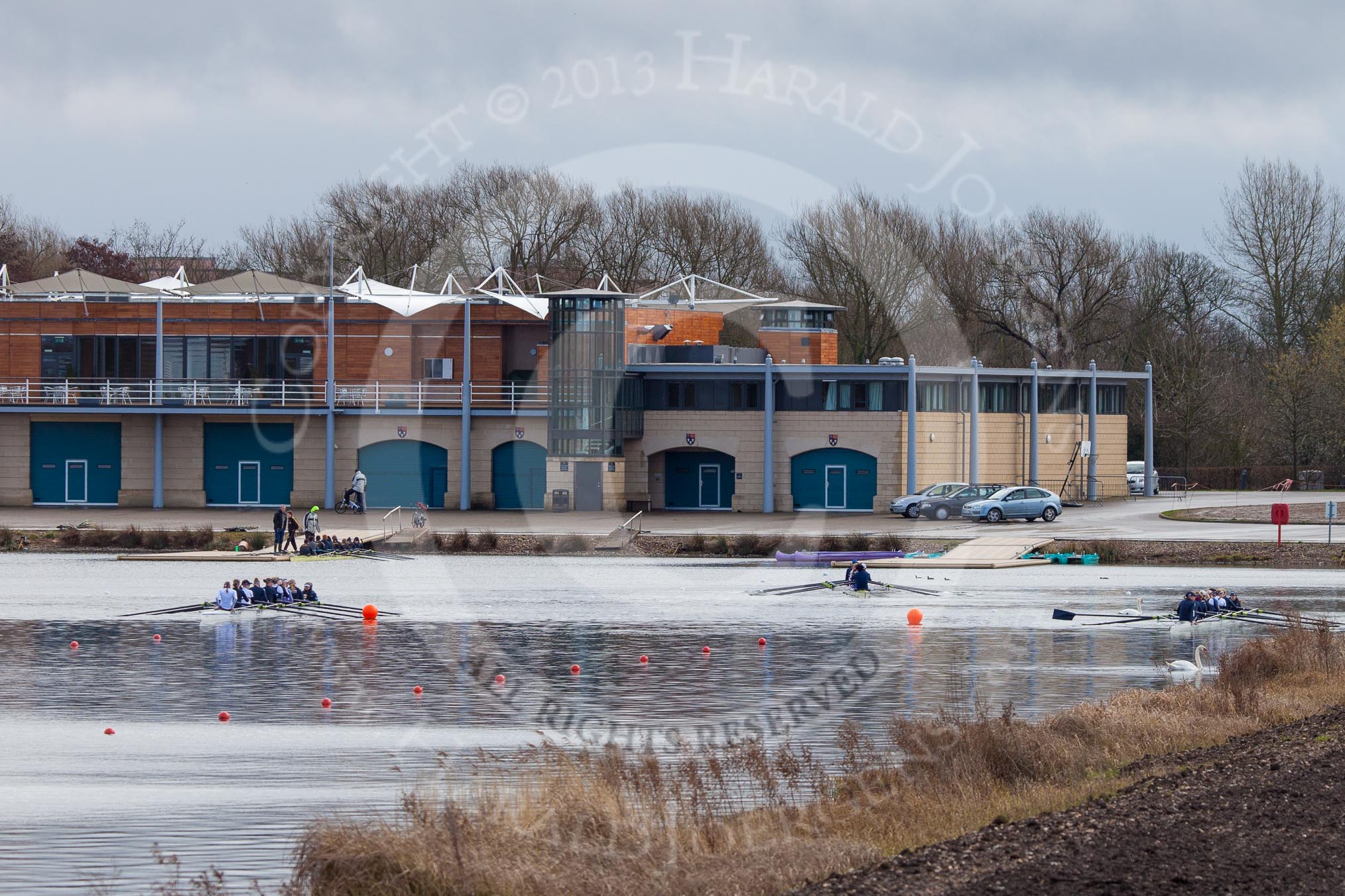 The Boat Race season 2013 - fixture OUWBC vs Olympians: Getting ready for a fixture at Dorney Lake, in front of the boathouse: On the left the OUWBC reserve boat Osiris, on their right the Olympians, on the very right the OUWBC Blue Boat..
Dorney Lake,
Dorney, Windsor,
Buckinghamshire,
United Kingdom,
on 16 March 2013 at 11:54, image #114