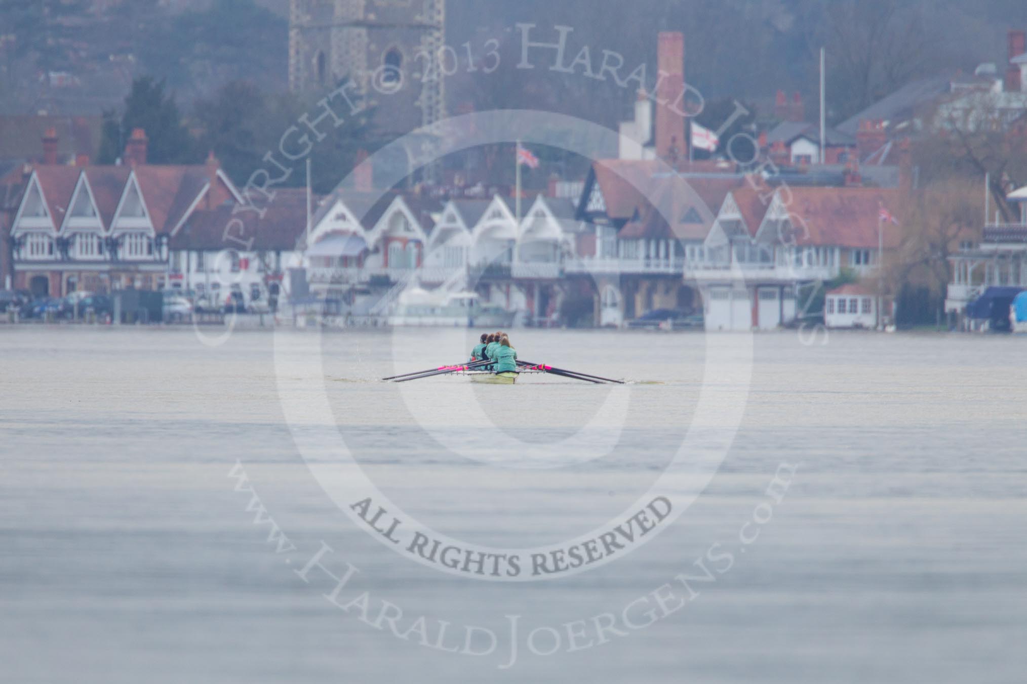 The Boat Race season 2013 - CUWBC training: The CUWBC Blue Boat on the way down the Thames, with Henley-on-Thames as backdrop..
River Thames near Remenham,
Henley-on-Thames,
Oxfordshire,
United Kingdom,
on 19 March 2013 at 15:30, image #18