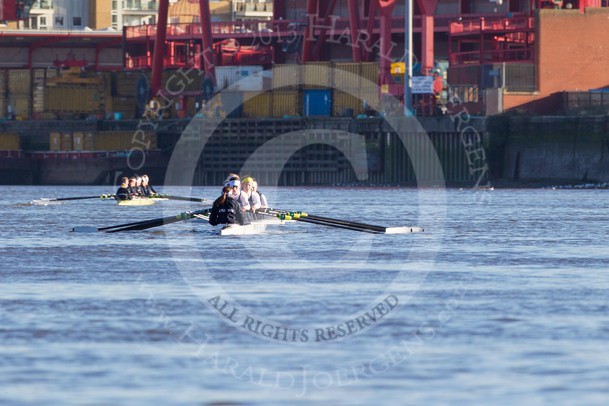 The Boat Race season 2014 - Women's Trial VIIIs (OUWBC, Oxford): The two OUWBC boats - Cleopatra, white, in front, and Boudicca, yellow, behind..
River Thames between Putney Bridge and Mortlake,
London SW15,

United Kingdom,
on 19 December 2013 at 12:23, image #1