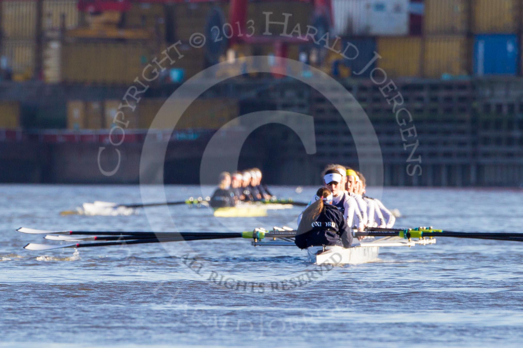 The Boat Race season 2014 - Women's Trial VIIIs (OUWBC, Oxford): The two OUWBC boats - Cleopatra, white, in focus..
River Thames between Putney Bridge and Mortlake,
London SW15,

United Kingdom,
on 19 December 2013 at 12:23, image #2