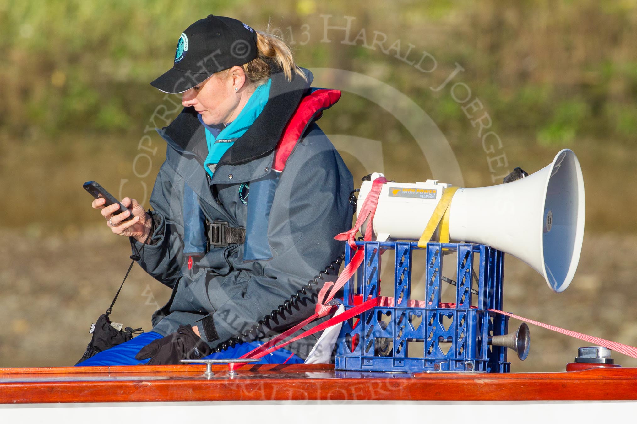 The Boat Race season 2014 - Women's Trial VIIIs (OUWBC, Oxford): Trial race umpire Sarah Winckless..
River Thames between Putney Bridge and Mortlake,
London SW15,

United Kingdom,
on 19 December 2013 at 12:34, image #30