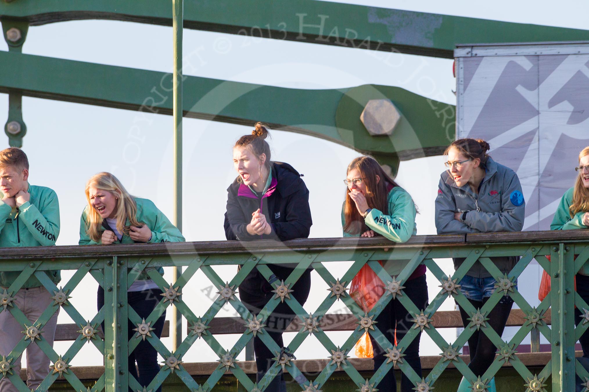 The Boat Race season 2014 - Women's Trial VIIIs(CUWBC, Cambridge): Onlookers watching the race from Hammersmith Bridge..
River Thames between Putney Bridge and Mortlake,
London SW15,

United Kingdom,
on 19 December 2013 at 14:10, image #404