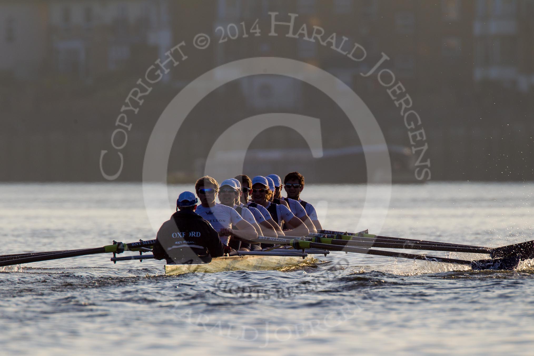 The Boat Race season 2014 - fixture OUBC vs German U23: The OUBC boat in the low evening sun..
River Thames between Putney Bridge and Chiswick Bridge,



on 08 March 2014 at 16:56, image #151
