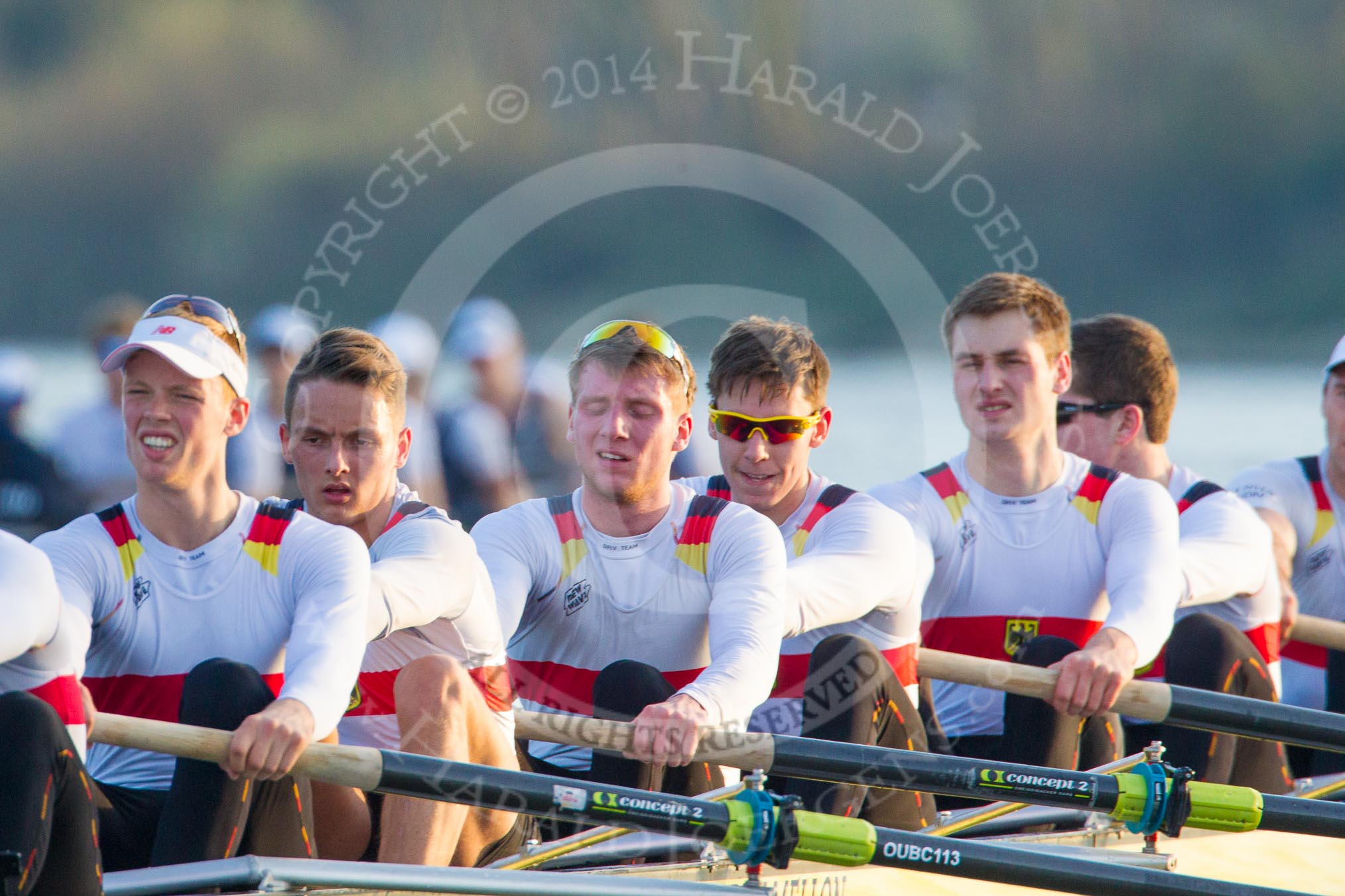 The Boat Race season 2014 - fixture OUBC vs German U23: The German U23-boat: 7 Ole Schwiethal, 6 Arne Schwiethal, 5 Johannes Weissenfeld, 4 Maximilian Korge, 3 Malte Daberkow, 2 Finn Knuppel. In the background the leading OUBC boat..
River Thames between Putney Bridge and Chiswick Bridge,



on 08 March 2014 at 17:02, image #196