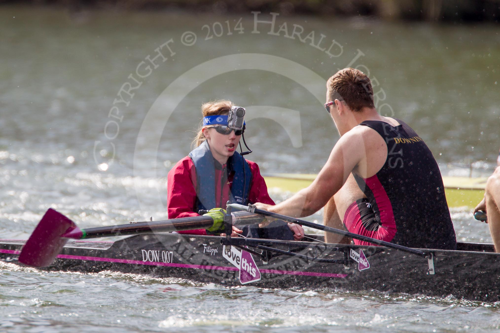 The Women's Boat Race and Henley Boat Races 2014: The Intercollegiate men's race. In the Downing College (Cambridge) boat cox Jess Stewart and stroke Michael Whetnall..
River Thames,
Henley-on-Thames,
Buckinghamshire,
United Kingdom,
on 30 March 2014 at 13:52, image #93