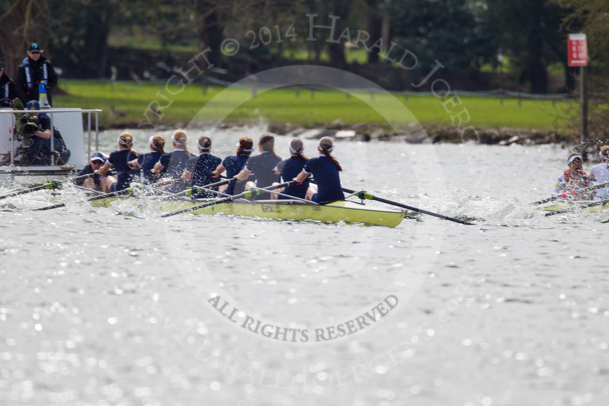 The Women's Boat Race and Henley Boat Races 2014: The Women's Reserves - Osiris v. Blondie race. Osiris (Oxford) with cox Olivia Cleary, stroke Hannah Roberts, 7 Claire Jamison, 6 Elo Luik, 5 Chloe Farrar, 4 Hannah Baddock, 3 Rhianna Cearns, 2 Hannah Ledbury, bow Dora Amos..
River Thames,
Henley-on-Thames,
Buckinghamshire,
United Kingdom,
on 30 March 2014 at 14:16, image #148