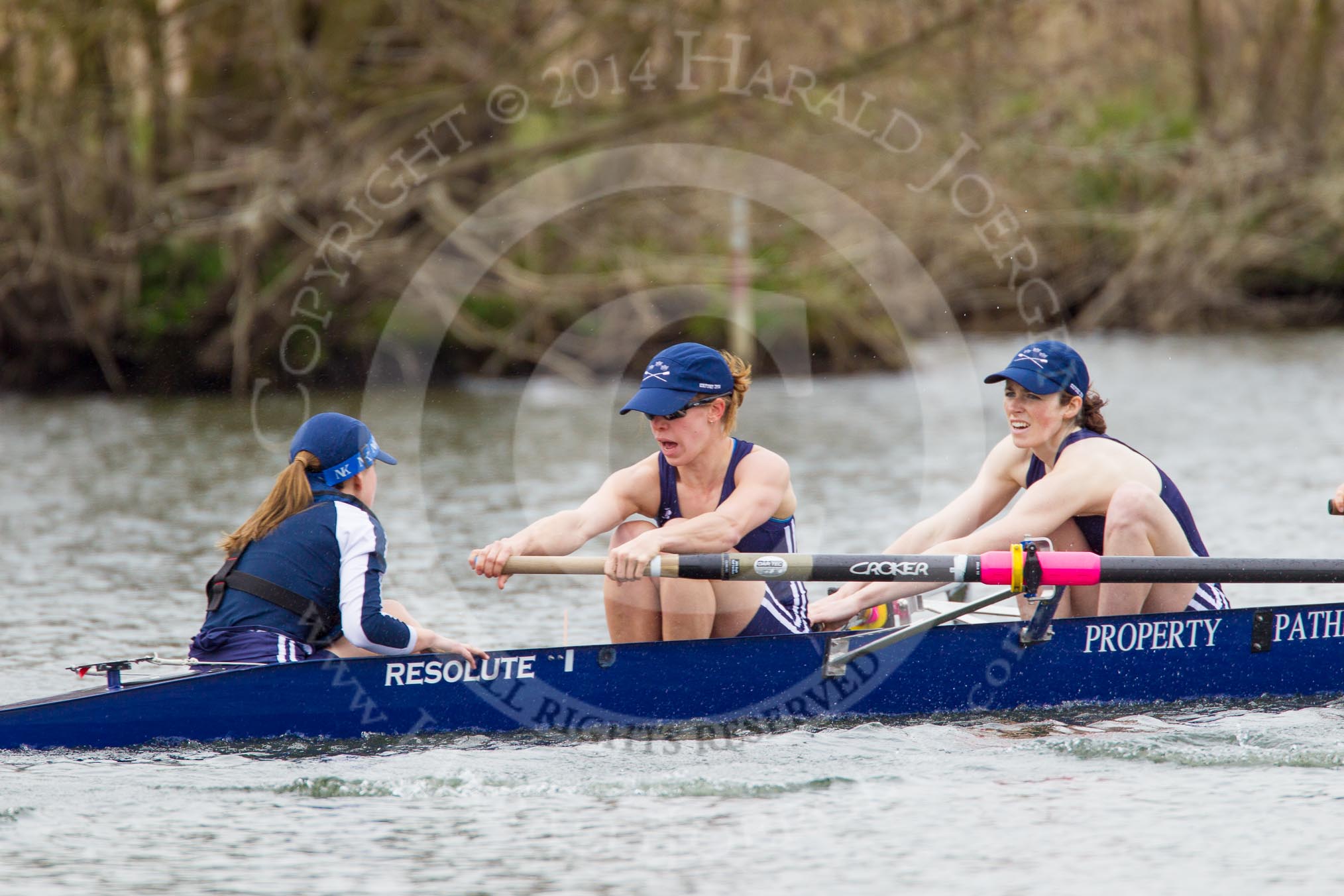 The Women's Boat Race and Henley Boat Races 2014: The OUWLRC boat in the lead - cox Lea Carrot, stroke Suzanne Cole, and 7 seat Emma Clifton..
River Thames,
Henley-on-Thames,
Buckinghamshire,
United Kingdom,
on 30 March 2014 at 14:49, image #233
