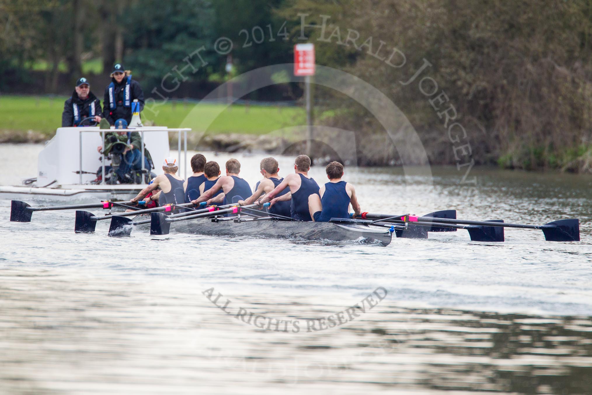 The Women's Boat Race and Henley Boat Races 2014: The Lightweight Men's Boat Race - OULRC vs CULRC, The Oxford boat is followed by the umpire's launch, with a TC cameraman in the front..
River Thames,
Henley-on-Thames,
Buckinghamshire,
United Kingdom,
on 30 March 2014 at 15:40, image #371