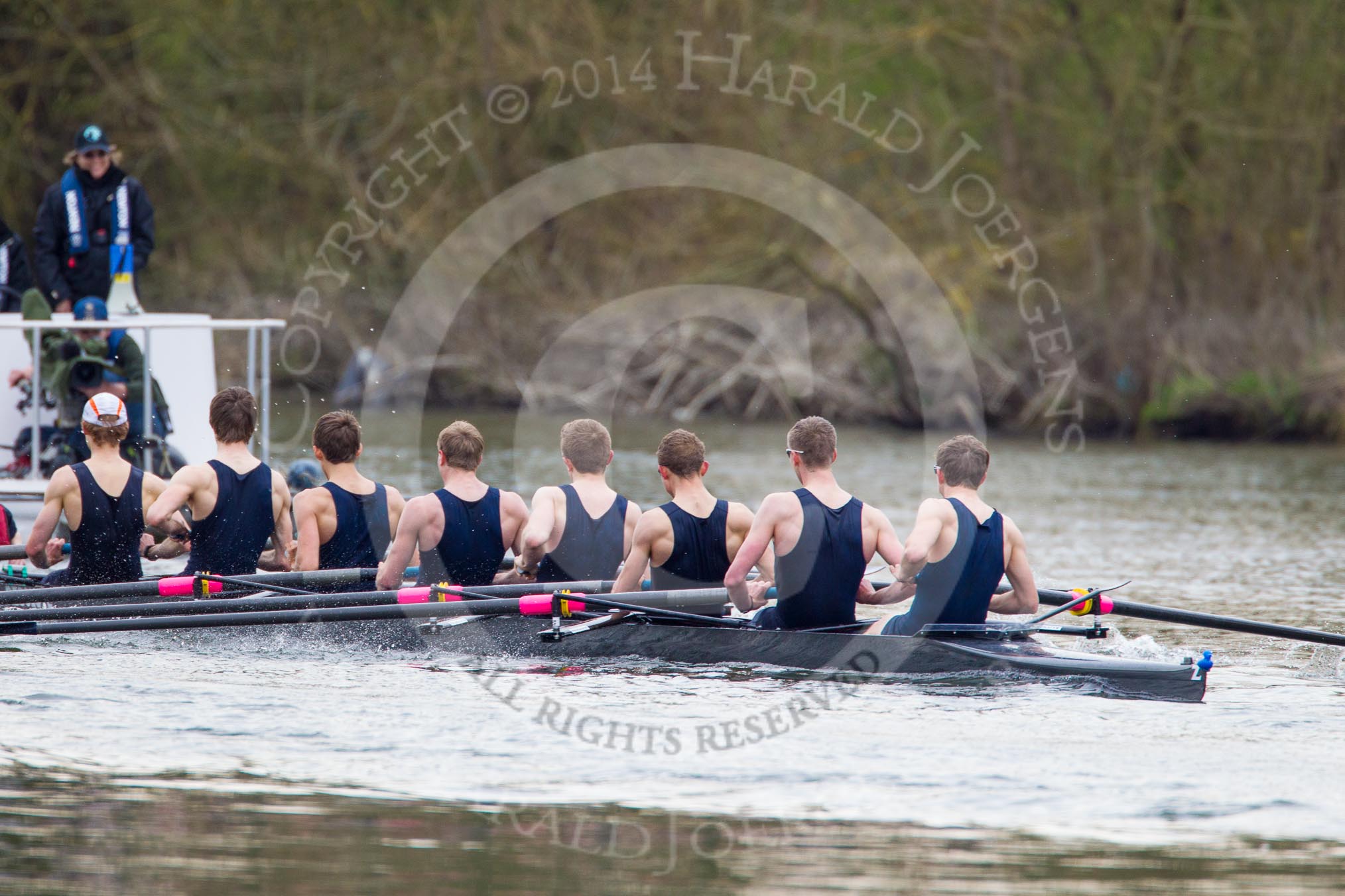 The Women's Boat Race and Henley Boat Races 2014: The Lightweight Men's Boat Race - OULRC vs CULRC, The Oxford boat is followed by the umpire's launch, with a TC cameraman in the front..
River Thames,
Henley-on-Thames,
Buckinghamshire,
United Kingdom,
on 30 March 2014 at 15:40, image #374