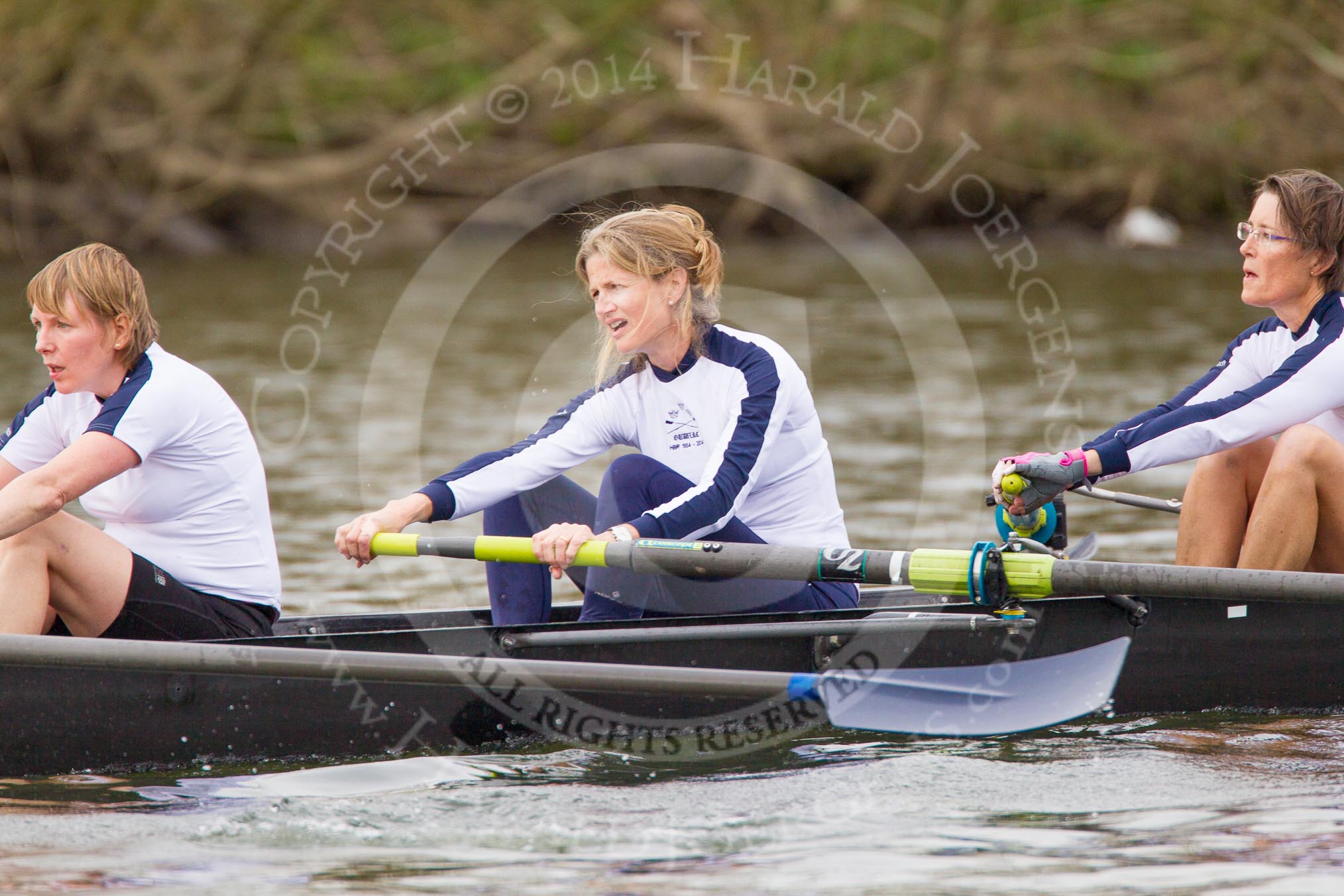 The Women's Boat Race and Henley Boat Races 2014: The Commemorative Row Past of the 1984 inaugural crews of the Oxford and Cambridge Women’s Lightweight races, to celebrate 30 years at Henley: In the OUWBC boat 6 seat Susannah Pulhams (Knight), 5 Ali Johansen (Blythe-Brook), 4 Emma Kelly (Platt)..
River Thames,
Henley-on-Thames,
Buckinghamshire,
United Kingdom,
on 30 March 2014 at 15:55, image #450