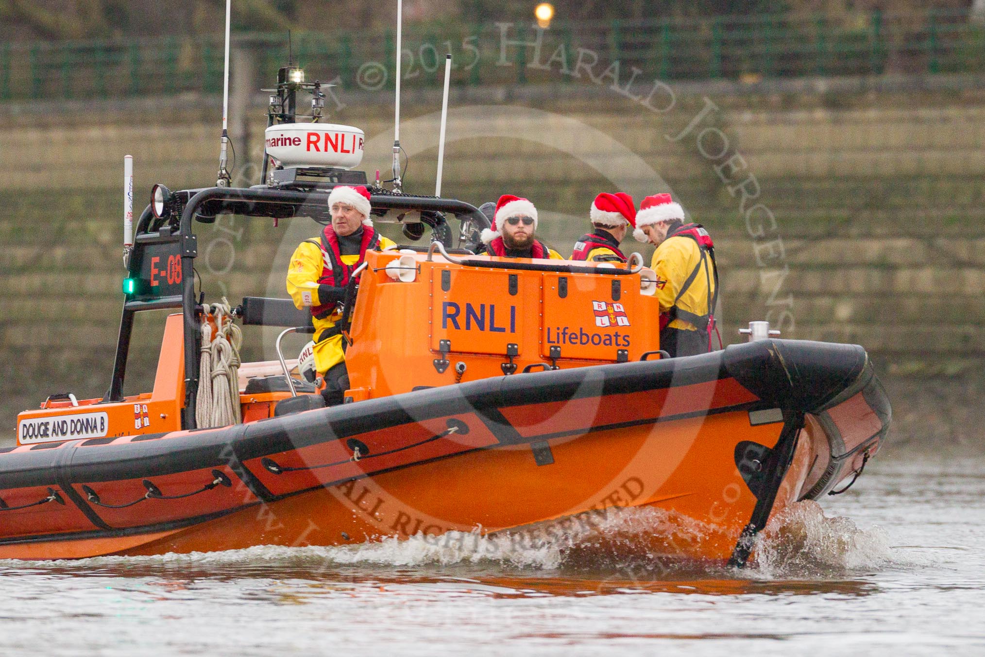 The Boat Race season 2016 - Women's Boat Race Trial Eights (CUWBC, Cambridge): RNLI E-Class lifeboat E08 with a crew in the Christmas spirit! See http://j.mp/rnli-e-class for a virtual of this high-tech boat..
River Thames between Putney Bridge and Mortlake,
London SW15,

United Kingdom,
on 10 December 2015 at 10:46, image #30