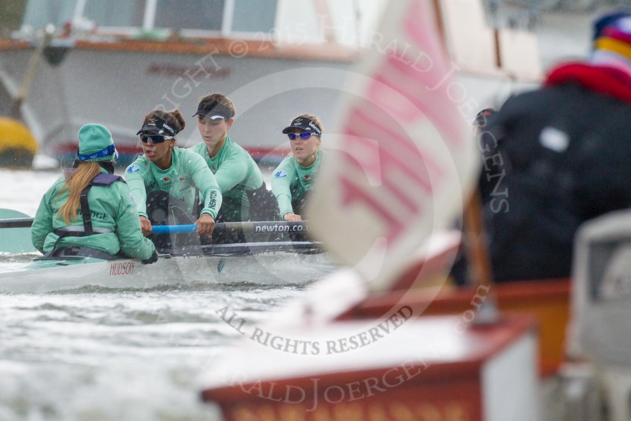 The Boat Race season 2016 - Women's Boat Race Trial Eights (CUWBC, Cambridge): "Tideway" at the start of the race, seen behind the umpire's boat, cox-Olivia Godwin, stroke-Daphne Martschenko, 7-Thea Zabell, 6-Alexandra Wood.
River Thames between Putney Bridge and Mortlake,
London SW15,

United Kingdom,
on 10 December 2015 at 11:04, image #46