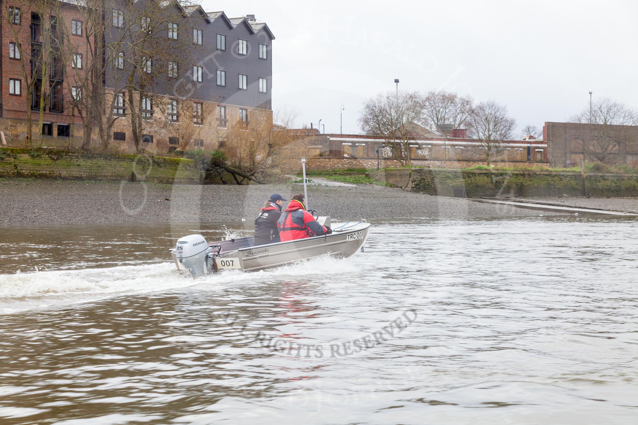 The Boat Race season 2016 - Women's Boat Race Trial Eights (CUWBC, Cambridge): CUWBC head coch Rob Barker in the tin boat folowing the race.
River Thames between Putney Bridge and Mortlake,
London SW15,

United Kingdom,
on 10 December 2015 at 11:22, image #117