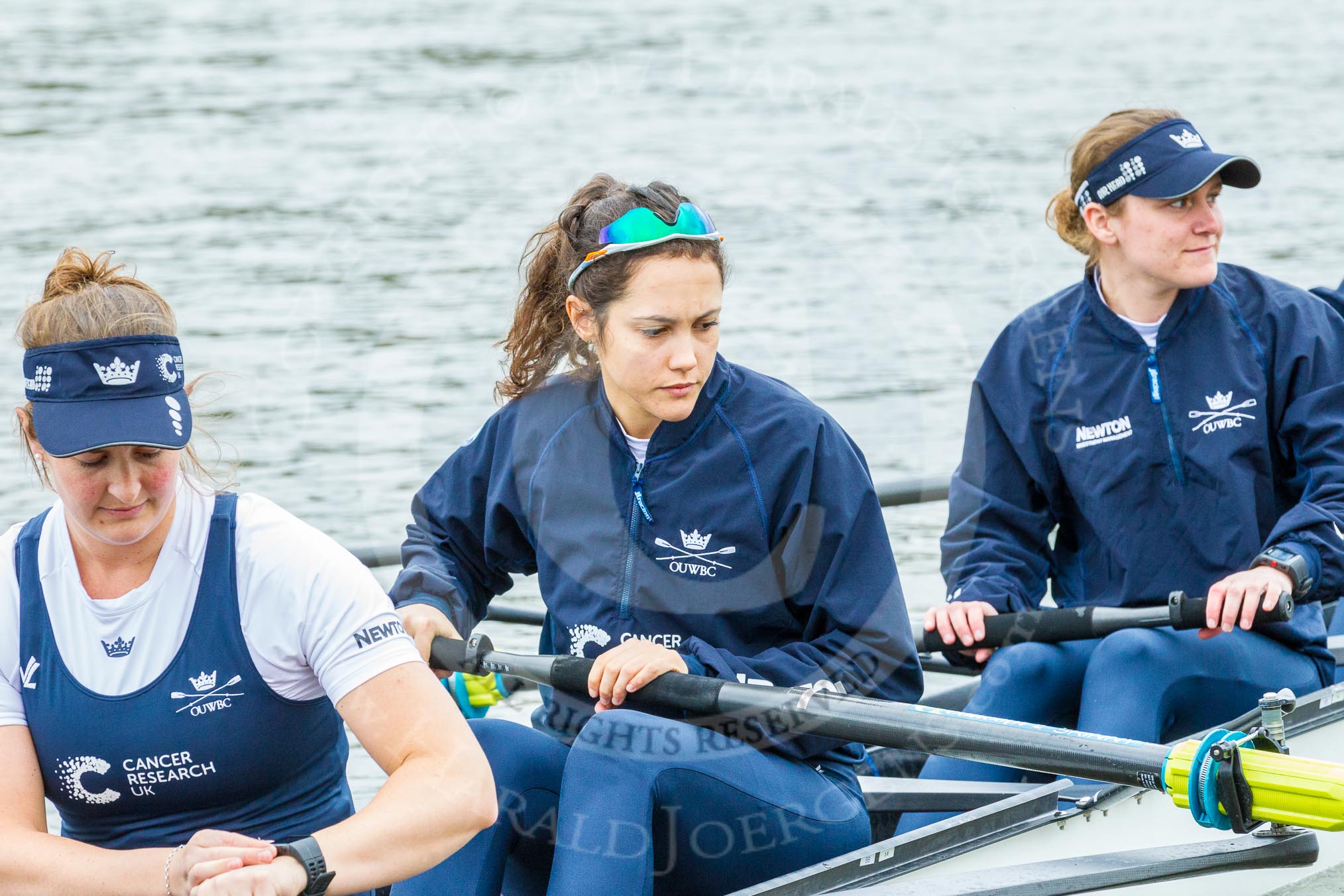 The Cancer Research UK Boat Race season 2017 - Women's Boat Race Fixture OUWBC vs Molesey BC: OUWBC getting their boat ready for the fixture, here 6 seat Harriet Austin, 5 seat Chloe Laverack and  4 seat Rebecca Esselstein.
River Thames between Putney Bridge and Mortlake,
London SW15,

United Kingdom,
on 19 March 2017 at 15:20, image #13
