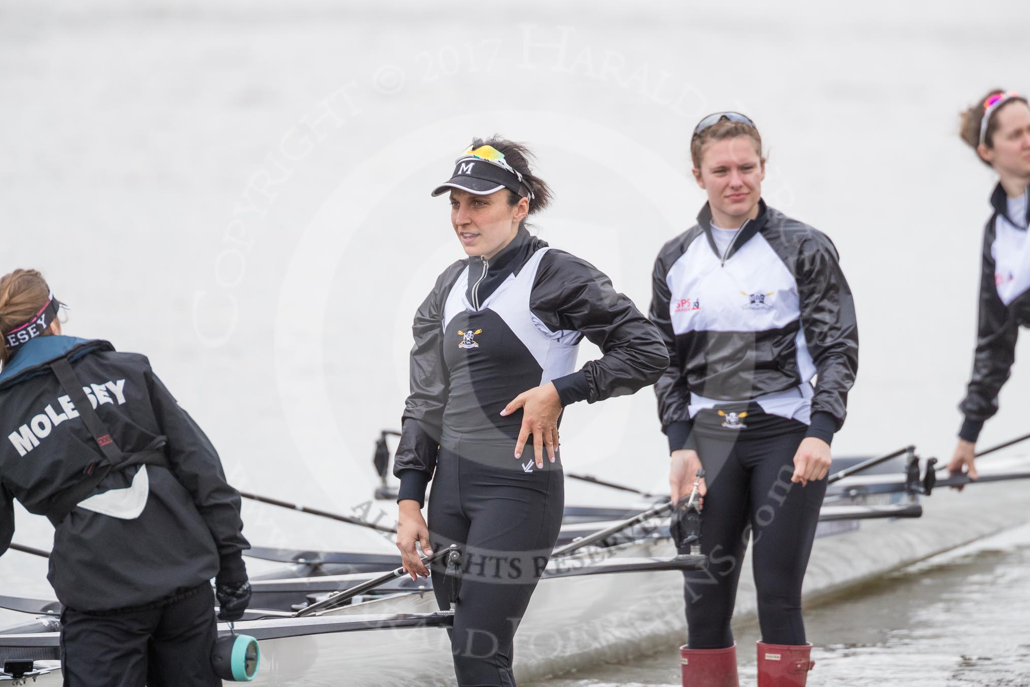 The Cancer Research UK Boat Race season 2017 - Women's Boat Race Fixture OUWBC vs Molesey BC: Molesey getting their boat ready - cox Anna Corderoy, 7 seat Gabriella Rodriguez, and 5 seat Katie Bartlett.
River Thames between Putney Bridge and Mortlake,
London SW15,

United Kingdom,
on 19 March 2017 at 15:25, image #25