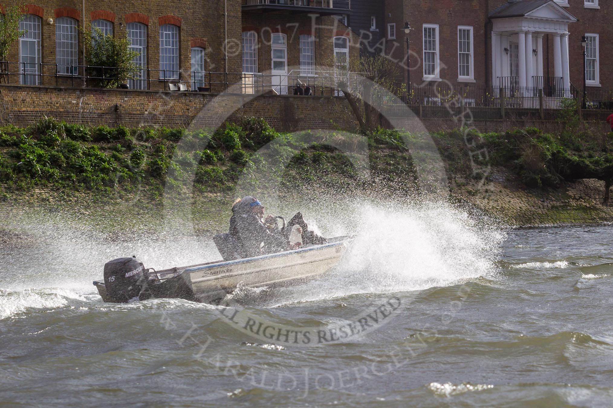 The Cancer Research UK Boat Race season 2017 - Women's Boat Race Fixture OUWBC vs Molesey BC: A coaches tin boat in very choppy waters.
River Thames between Putney Bridge and Mortlake,
London SW15,

United Kingdom,
on 19 March 2017 at 16:23, image #147