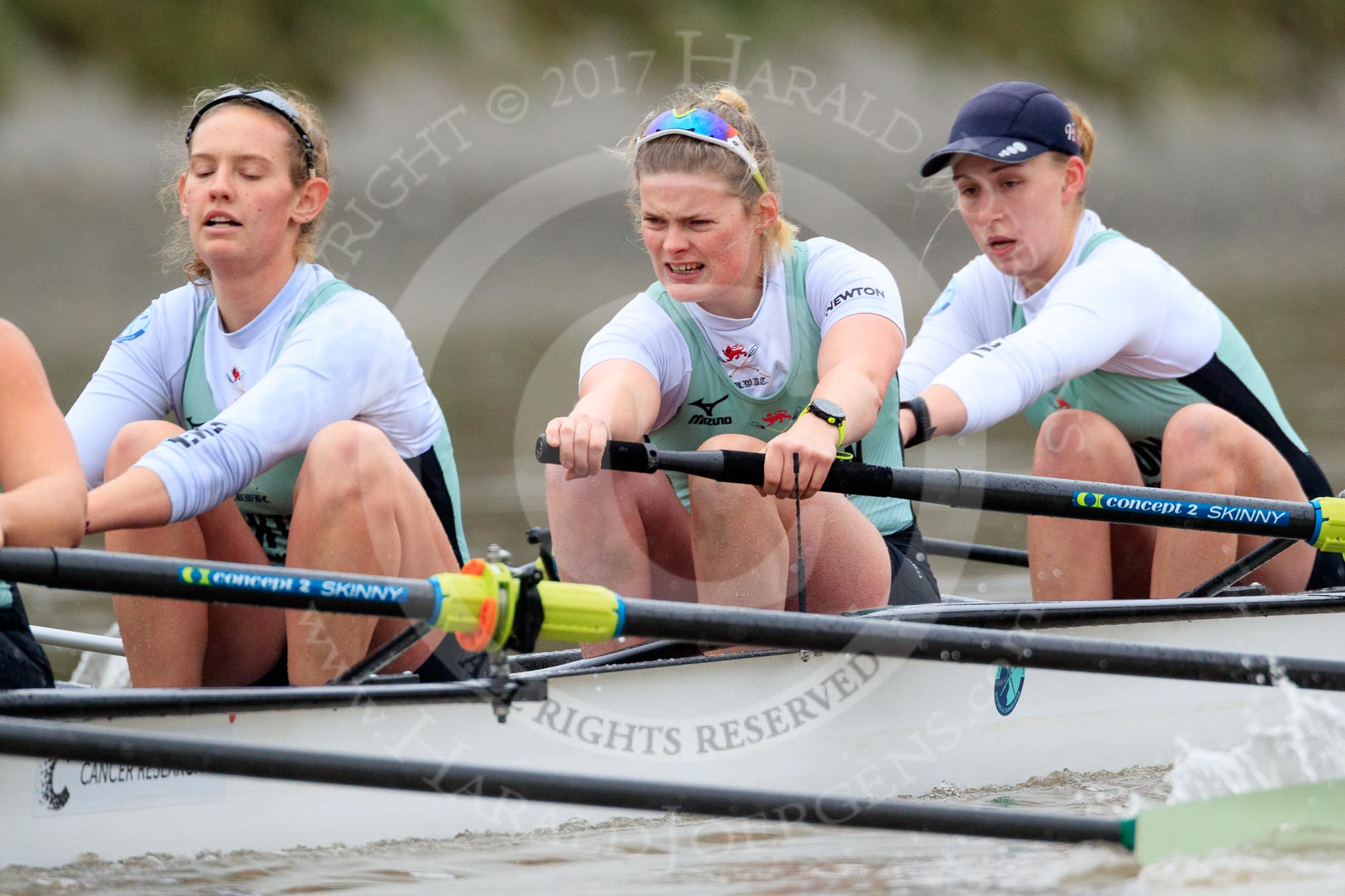 The Boat Race season 2018 - Women's Boat Race Trial Eights (CUWBC, Cambridge): Expecto Patronum  near Hammersmith Bridge, here 4 Laura Foster, 3 Sally O Brien, 2 Millie Perrin.
River Thames between Putney Bridge and Mortlake,
London SW15,

United Kingdom,
on 05 December 2017 at 12:49, image #100