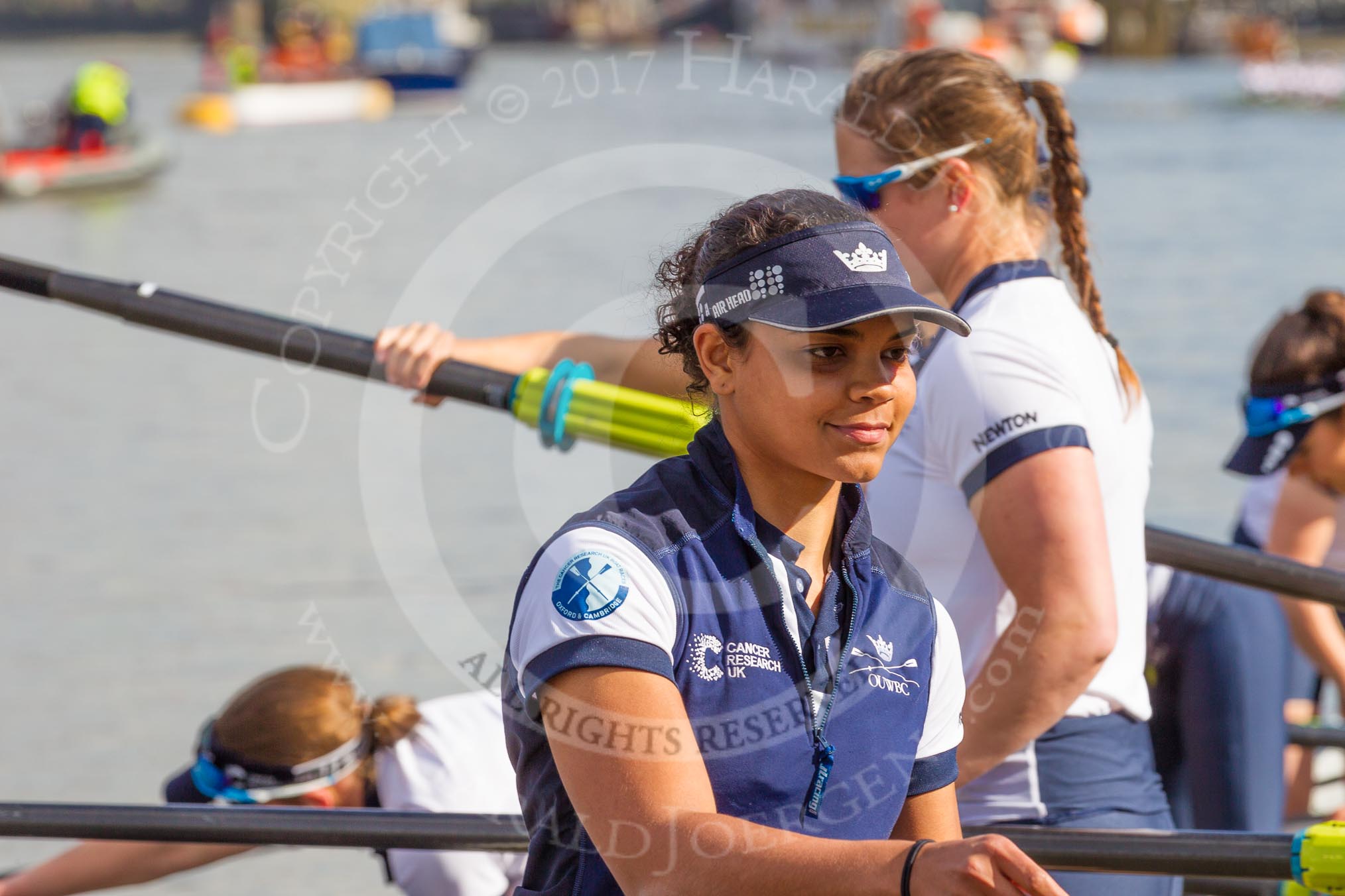 The Boat Race season 2017 -  The Cancer Research Women's Boat Race: OUWBC getting their boat ready, here 7 seat 7 Jenna Hebert.
River Thames between Putney Bridge and Mortlake,
London SW15,

United Kingdom,
on 02 April 2017 at 15:51, image #83