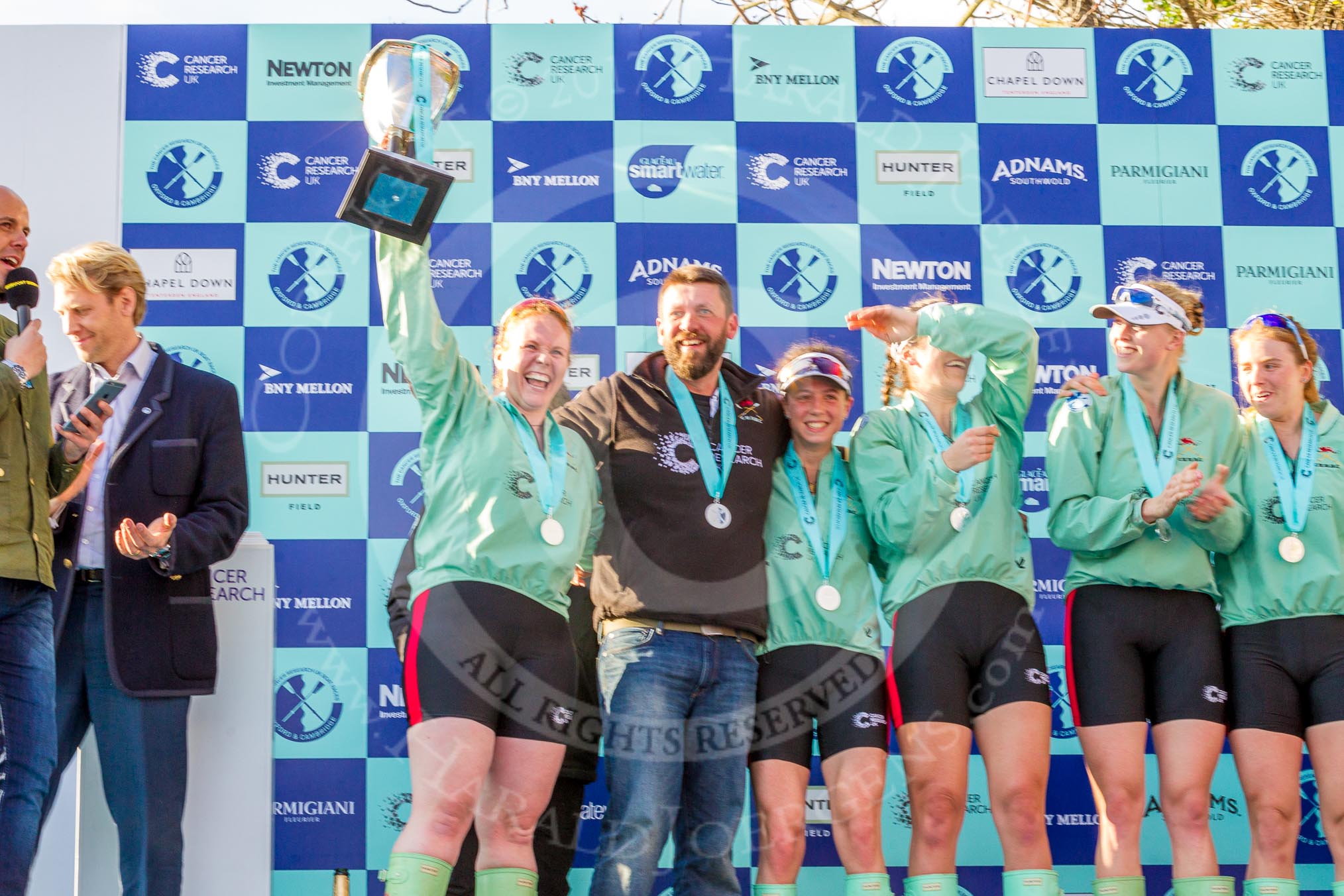 The Boat Race season 2017 -  The Cancer Research Women's Boat Race: A jubilant Ashton Brown with the Women's Boat Race trophy at the price giving.
River Thames between Putney Bridge and Mortlake,
London SW15,

United Kingdom,
on 02 April 2017 at 17:11, image #239