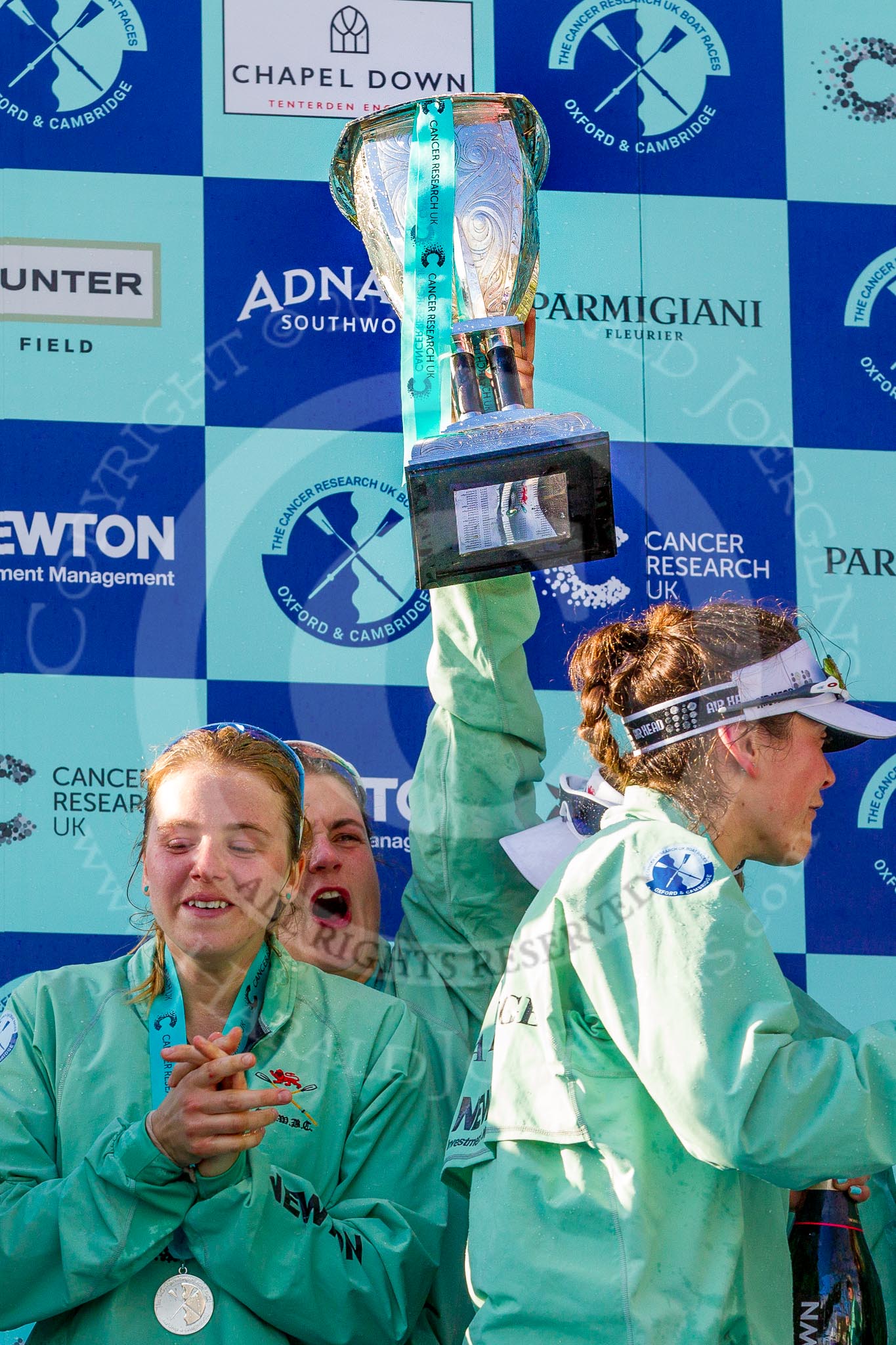 The Boat Race season 2017 -  The Cancer Research Women's Boat Race: CUWBC after the Chanpange spraying at the price giving, with the Women's Boat Race trophy. Alice White, and Claire Lambe with th etrophy.
River Thames between Putney Bridge and Mortlake,
London SW15,

United Kingdom,
on 02 April 2017 at 17:13, image #292