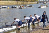 The Boat Race season 2017 -  The Cancer Research Women's Boat Race: OUWBC getting their boat into the water, here 4 Rebecca Esselstein, 3 Rebecca Te Water Naudé, 2 Flo Pickles, bow Alice Roberts, and cox Eleanor Shearer.
River Thames between Putney Bridge and Mortlake,
London SW15,

United Kingdom,
on 02 April 2017 at 15:50, image #81