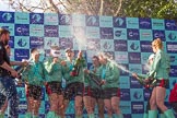 The Boat Race season 2017 -  The Cancer Research Women's Boat Race: CUWBC covered in spray (Cahmpagne, not Thames water) at the price giving.
River Thames between Putney Bridge and Mortlake,
London SW15,

United Kingdom,
on 02 April 2017 at 17:13, image #270