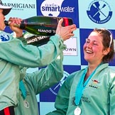 The Boat Race season 2017 -  The Cancer Research Women's Boat Race: CUWBC working hard to empty the bottles of Champagne at the price giving - on the right stroke Melissa Wilson.
River Thames between Putney Bridge and Mortlake,
London SW15,

United Kingdom,
on 02 April 2017 at 17:13, image #281