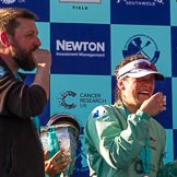 The Boat Race season 2017 -  The Cancer Research Women's Boat Race: CUWBC after the Chanpange spraying at the price giving - head coach Rob Barker, (possibly) Imogen Grant with the Women's Boat Race trophy, and Claire Lambe.
River Thames between Putney Bridge and Mortlake,
London SW15,

United Kingdom,
on 02 April 2017 at 17:13, image #282