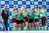 The Boat Race season 2017 -  The Cancer Research Women's Boat Race: CUWBC after the Chanpange spraying at the price giving, with the Women's Boat Race trophy. On the left head coach Rob Barker.
River Thames between Putney Bridge and Mortlake,
London SW15,

United Kingdom,
on 02 April 2017 at 17:13, image #289