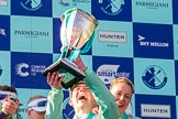 The Boat Race season 2017 -  The Cancer Research Women's Boat Race: CUWBC with the Womwn's Boat Race trophy at the price giving - and a very excited cox Matthew Holland with the Women's Boat Race trophy.
River Thames between Putney Bridge and Mortlake,
London SW15,

United Kingdom,
on 02 April 2017 at 17:14, image #298